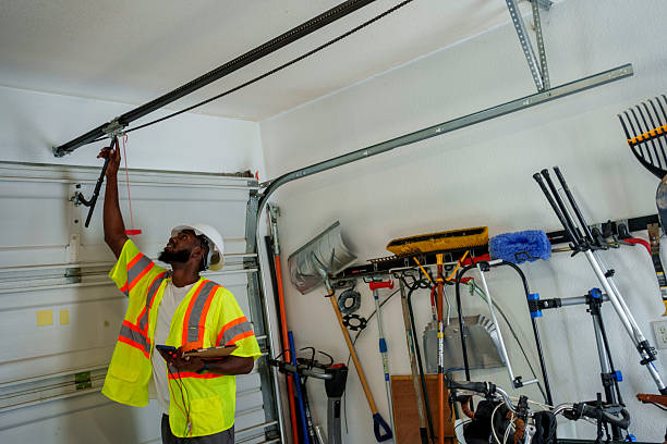 Professional Garage Door Roller Replacement technician working in Mastic, NY